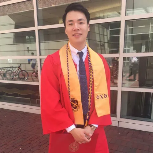 Graduation portrait in front of the Boston University gym