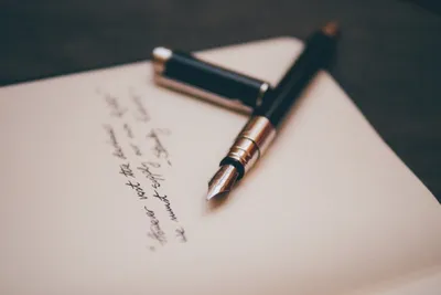 Image of notebook and pen
